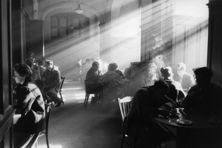 black and white photograph of students sitting in a café at the University of Edinburgh © Estate of Robert Blomfield